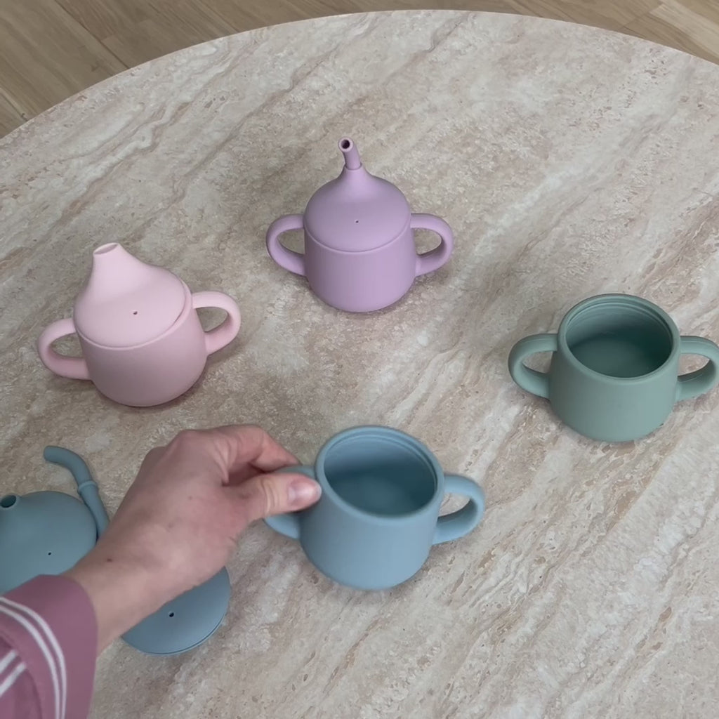 Tasse d'apprentissage rose