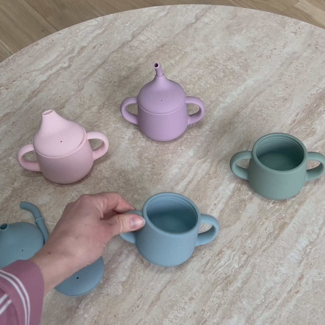 Tasse d'apprentissage rose