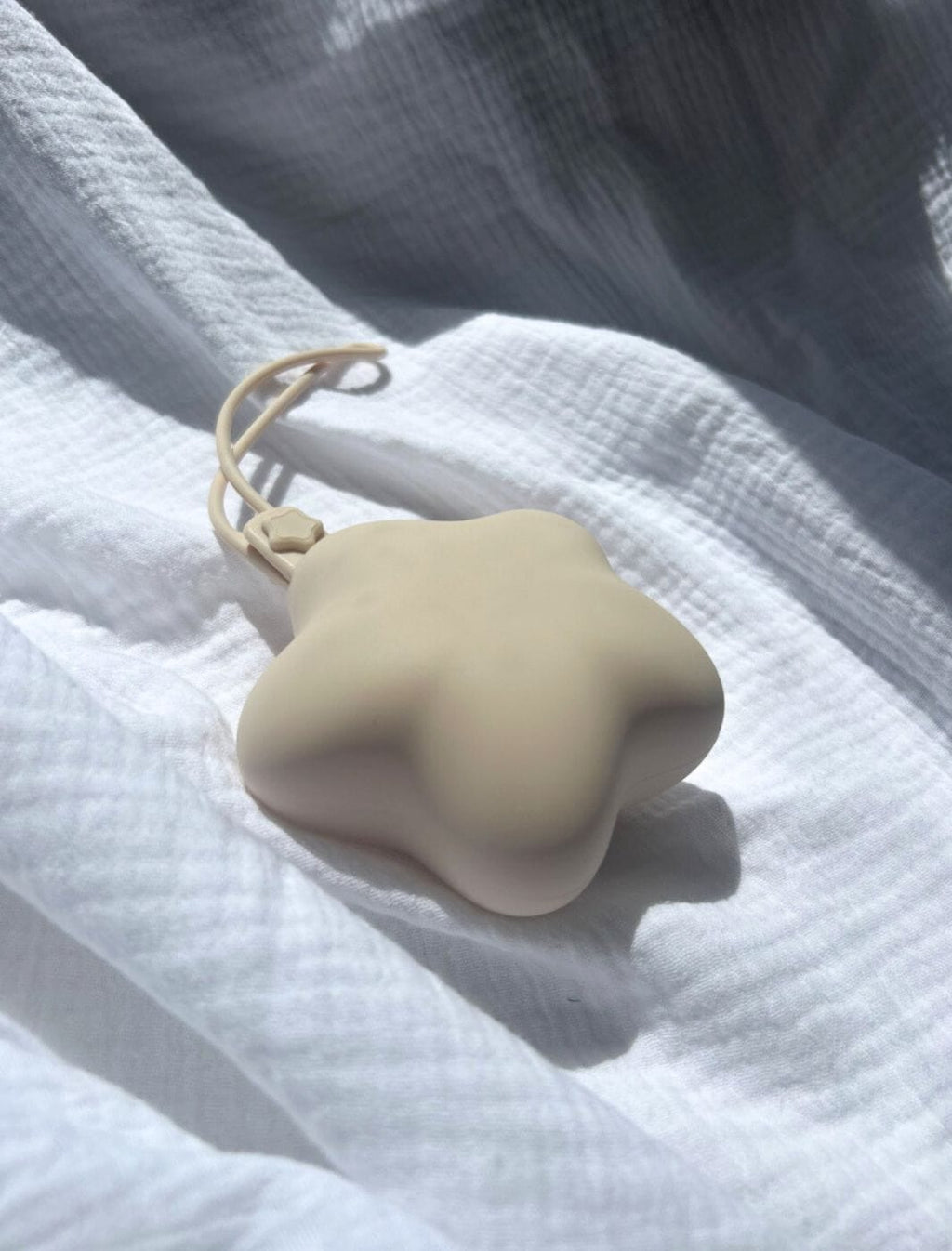 Range tétine étoile beige