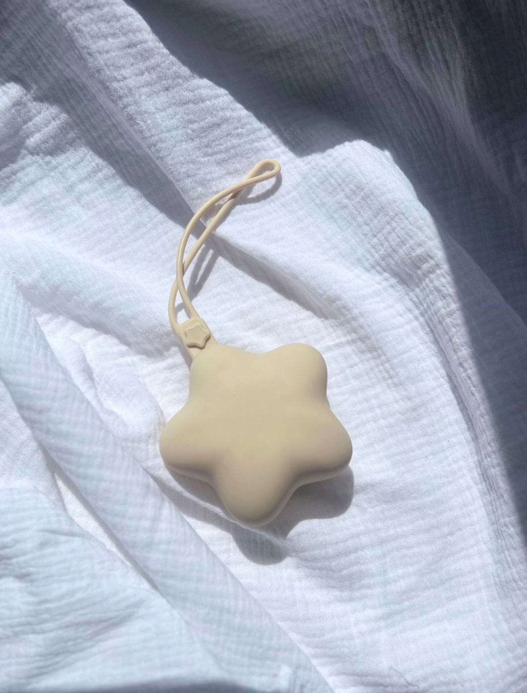 Range tétine étoile beige